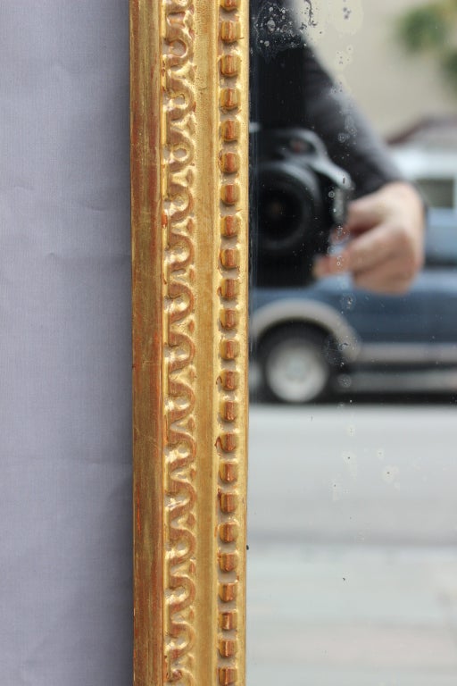 Great hand carved and water Gilt frame with a row of pearls next to a row of  half 