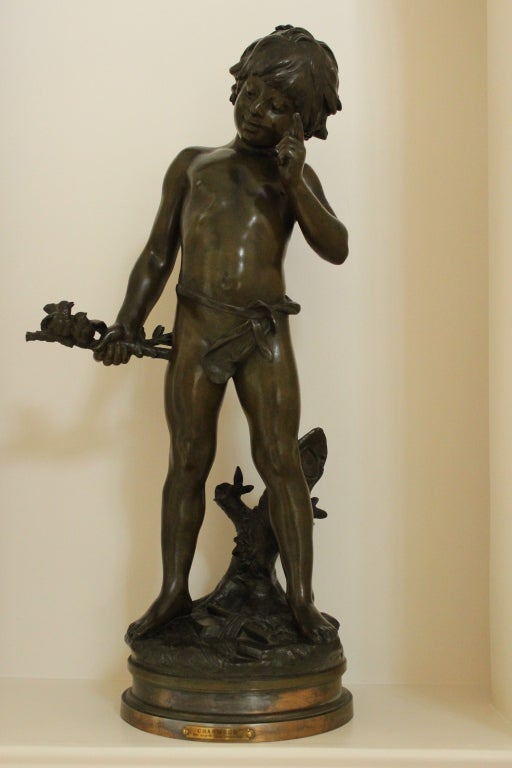 Incredibly realist and graceful statue of a young child  w/birds on a branch that he holds in his right hand when his left hand finger and his face and smile make us think he is talking to them .<br />
<br />
Auguste Louis Mathurin Moreau(French