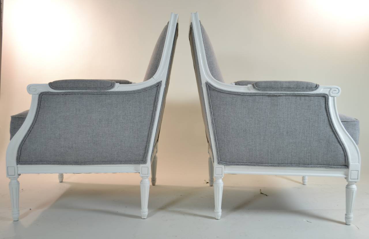 Lacquered in satin finish dove white and newly upholstered in fine quality grey tweedy velvet.