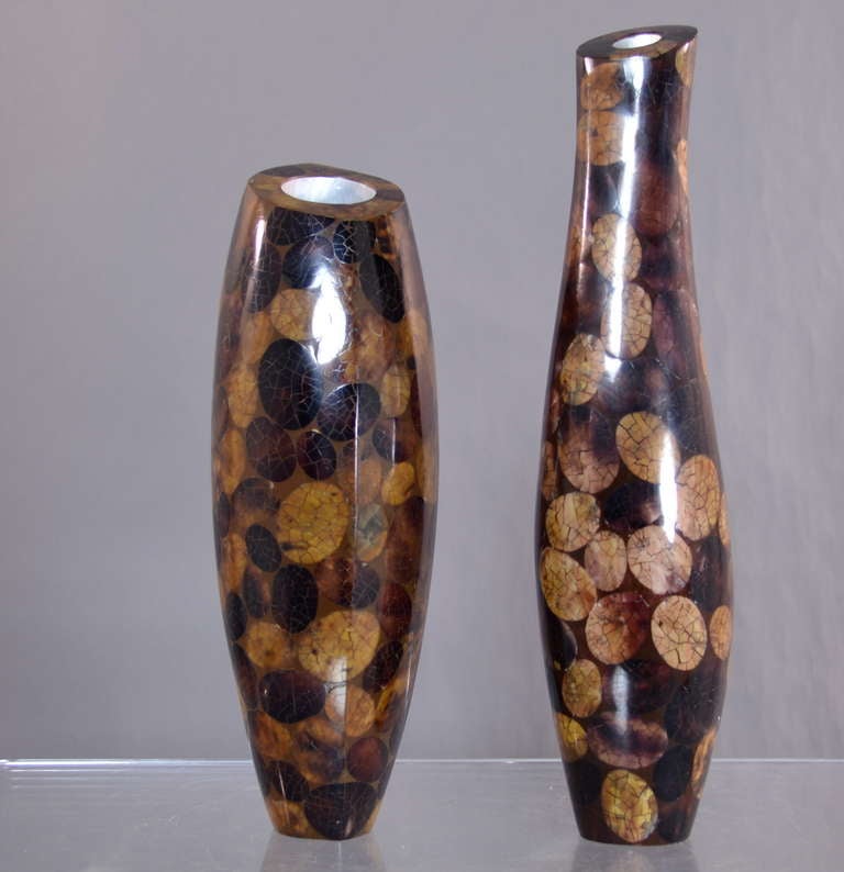 These two organic form vases veneered in natural pallette exotic materials, primarily coconut shell were produced by R & Y Augousti.They are priced as a pair here but may be purchased individually:
Taller vase: 16.25