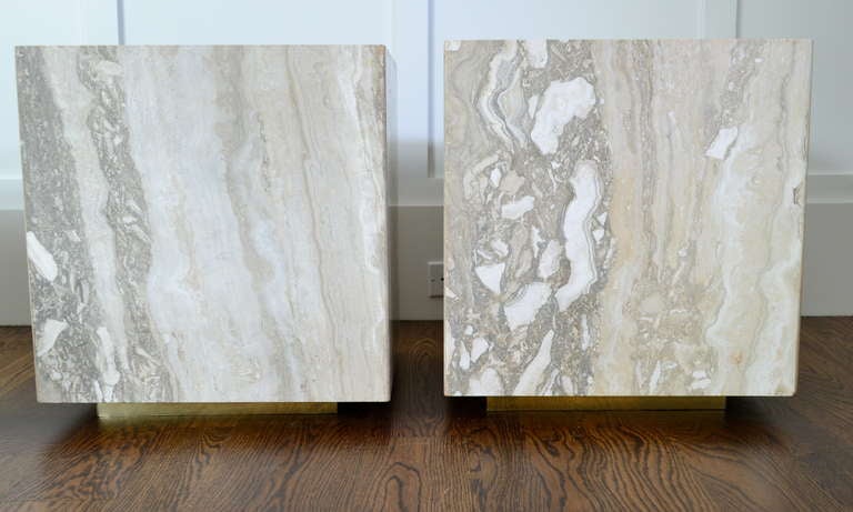 Beautifully figured marble cubes sitting on brass-clad bases. Modern, elegant and organic.  Some silicon caulk visible in interior but excellent condition on exterior.