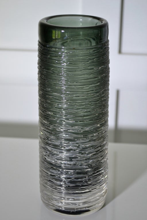 A beautifully crafted applied glass vase in clear to grey glass made by Skruff Glass Works in Sweden, designed by Bengf Edenfalk (see signature). The vase has nice weight and the fine detail of the applied decoration is wonderful.