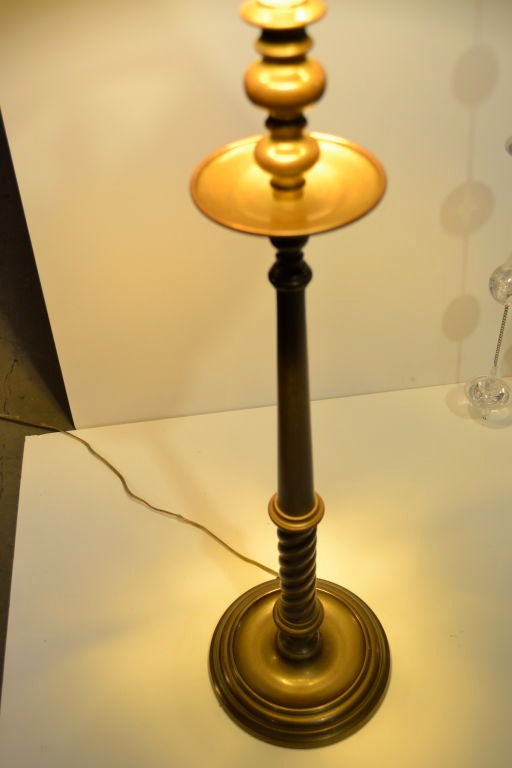 Very tall brass lamps with original blackpainted brass shades. In attractive pattinated finish but could easily be polished. 37