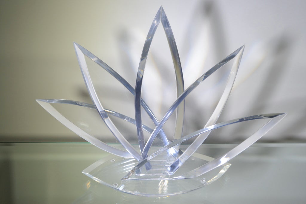 A graphic lucite sculpture by Hivo G. Van Teal. Signed on the base.