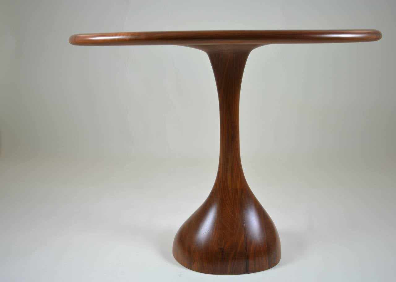 Wonderful sculptural form, hand-carved in walnut with an interesting pierced design on the top. All rounded edges. Newly refinished in a soft satin.