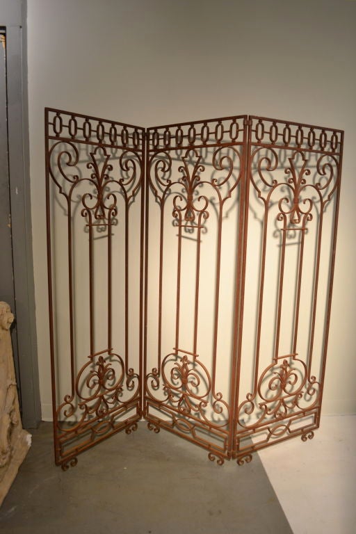 Decorative 3-panel wrought iron screen stamped 