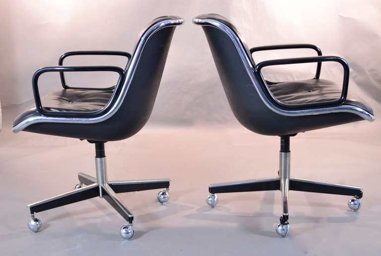 A classic chair designed by Charles Pollack for Knoll--this example dated 1978. Upholstered in the original black leather with black arms. Height is adjustable.