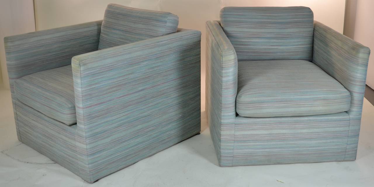 Fine quality upholstered chairs in cube form with loose seat and back cushions. Good size, super comfortable. Currently upholstered in woven silk and cotton stripe, fabric is serviceable but would be better replaced.