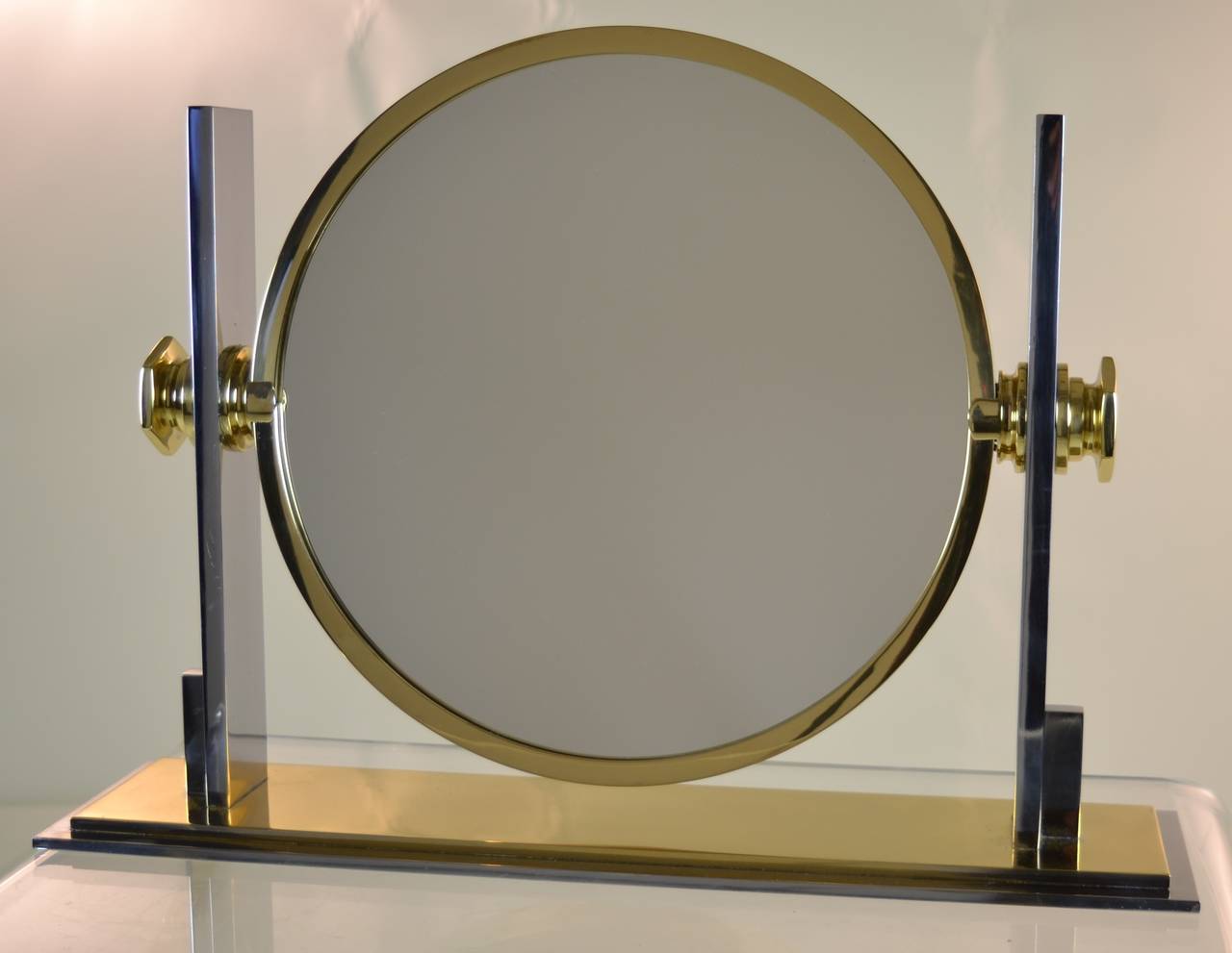 A large version of this Classic vanity mirror. The best quality. Very heavy, with a magnifying mirror on one side. The mirror is 14