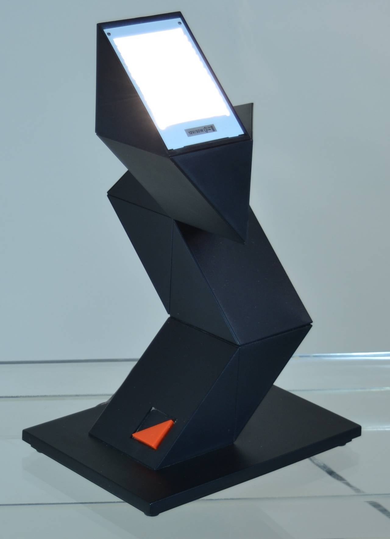 This is an amazing lamp --sort of a Rubik's Cube that can be manipulated via turning the plastic blocks to an amazing number of configurations. More configurations than we can show here. Manufactured in Switzerland for New Horizons Product