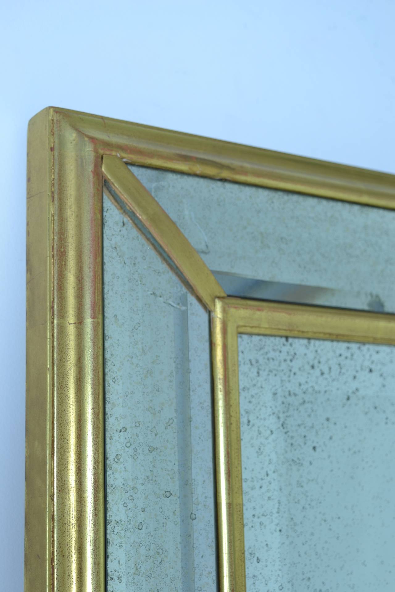 Late 20th Century Pair of Water Gilded Trumeau Mirrors with Faceted Surround