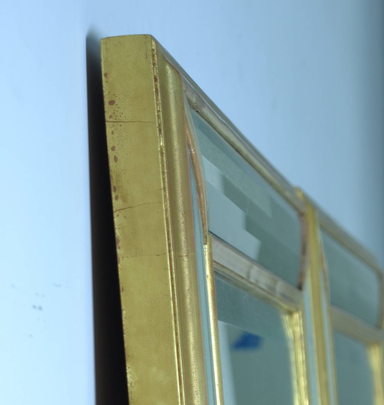 Pair of Water Gilded Trumeau Mirrors with Faceted Surround 1