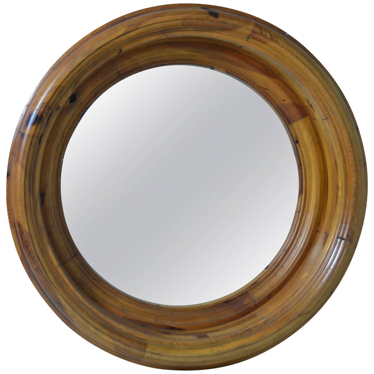 Very high quality, heavy wood porthole-style mirror by Ralph Lauren home collection with deeply recessed glass. Rich wood character, impressive size: at inches in diameter and 11.5 inches depth. Big presence.