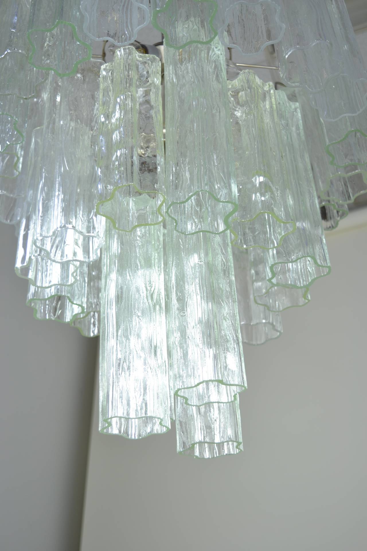 Nice large tronchi tube chandelier, clear Murano glass on chrome form. Alternating 12