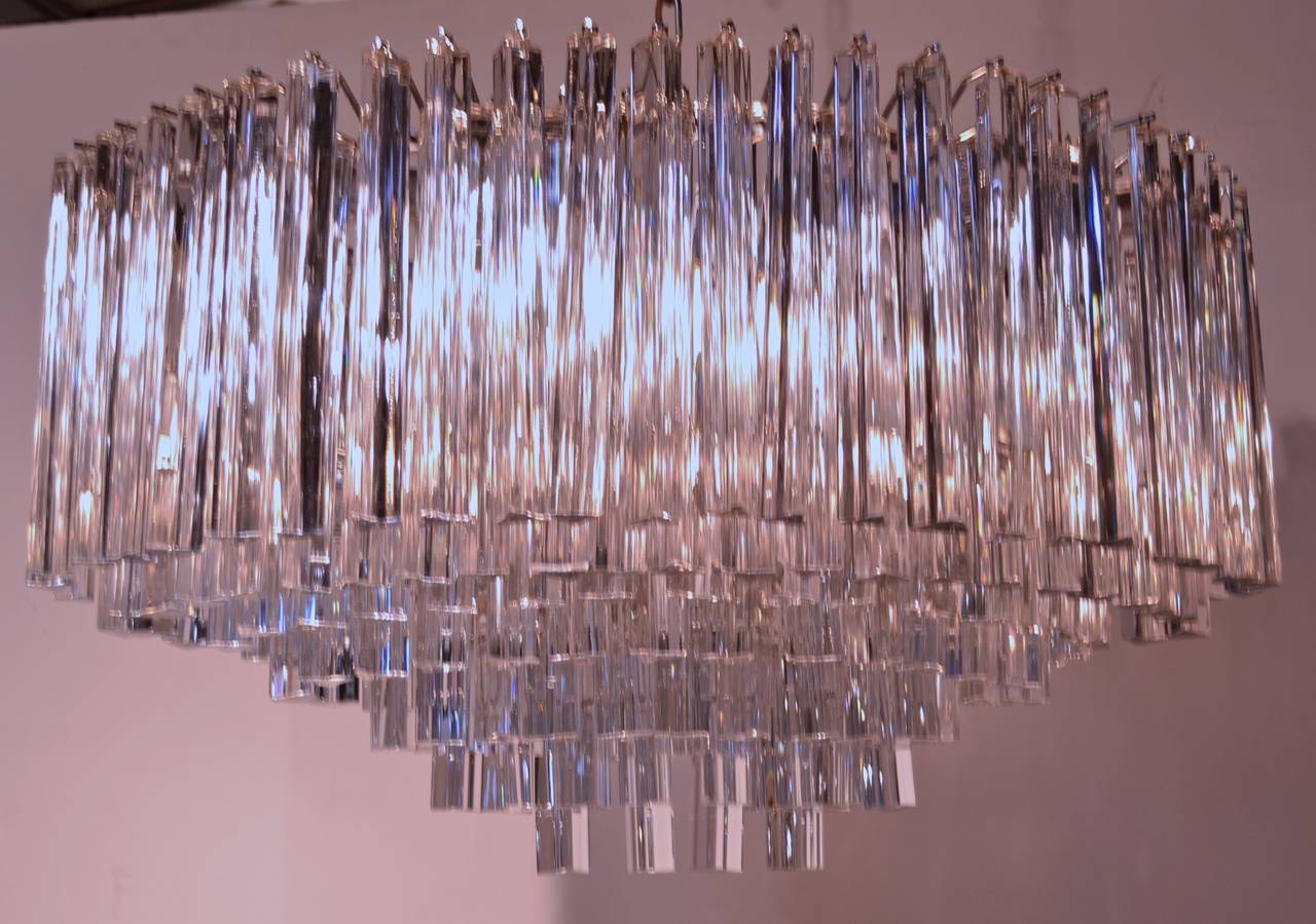 Handsome, heavily crystalled chandelier, unusually beautiful looking up from beneath due to tight crystal placement. Nice size: 33