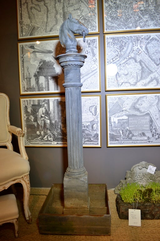 These fine examples of Victorian English hitching posts have been customized with heavy gauge steel boxes for holding plantings. The boxes are extremely well constructed, featuring small feet at each corner and 4 compartments braced with additonal