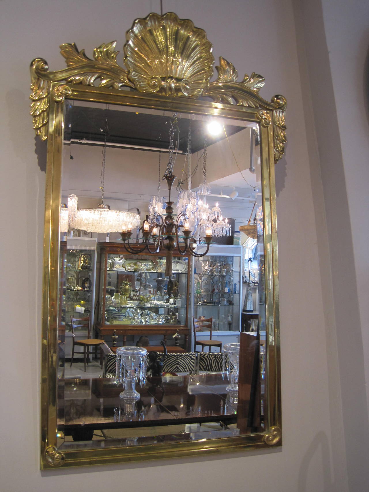 Pair of Mastercraft Style Brass Shell Motif Mirrors, Each one of rectangualr form with finely cast shell motif.