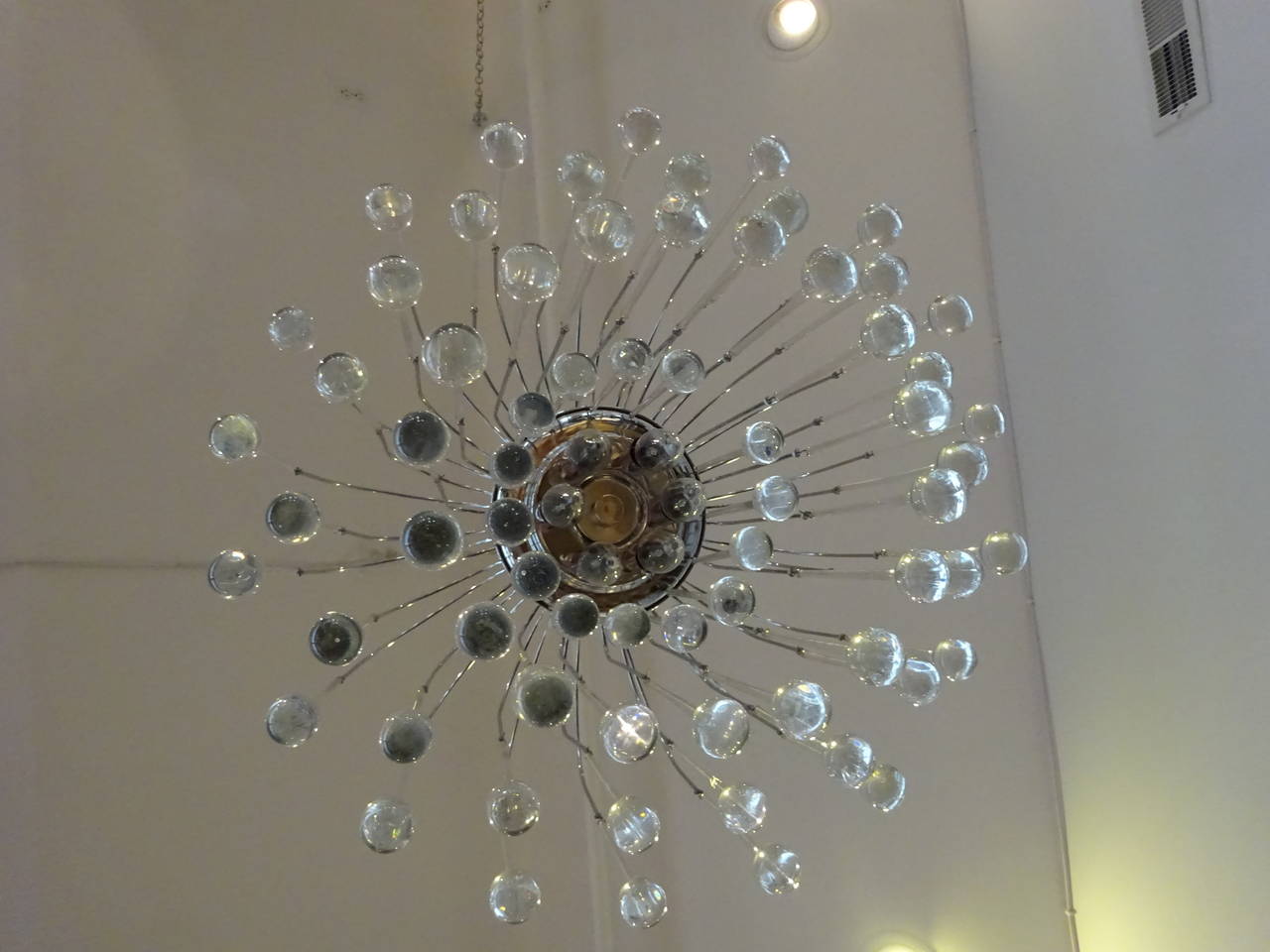 Venini style fountain chandelier, three tiers of teardrop crystals, six interior lights.