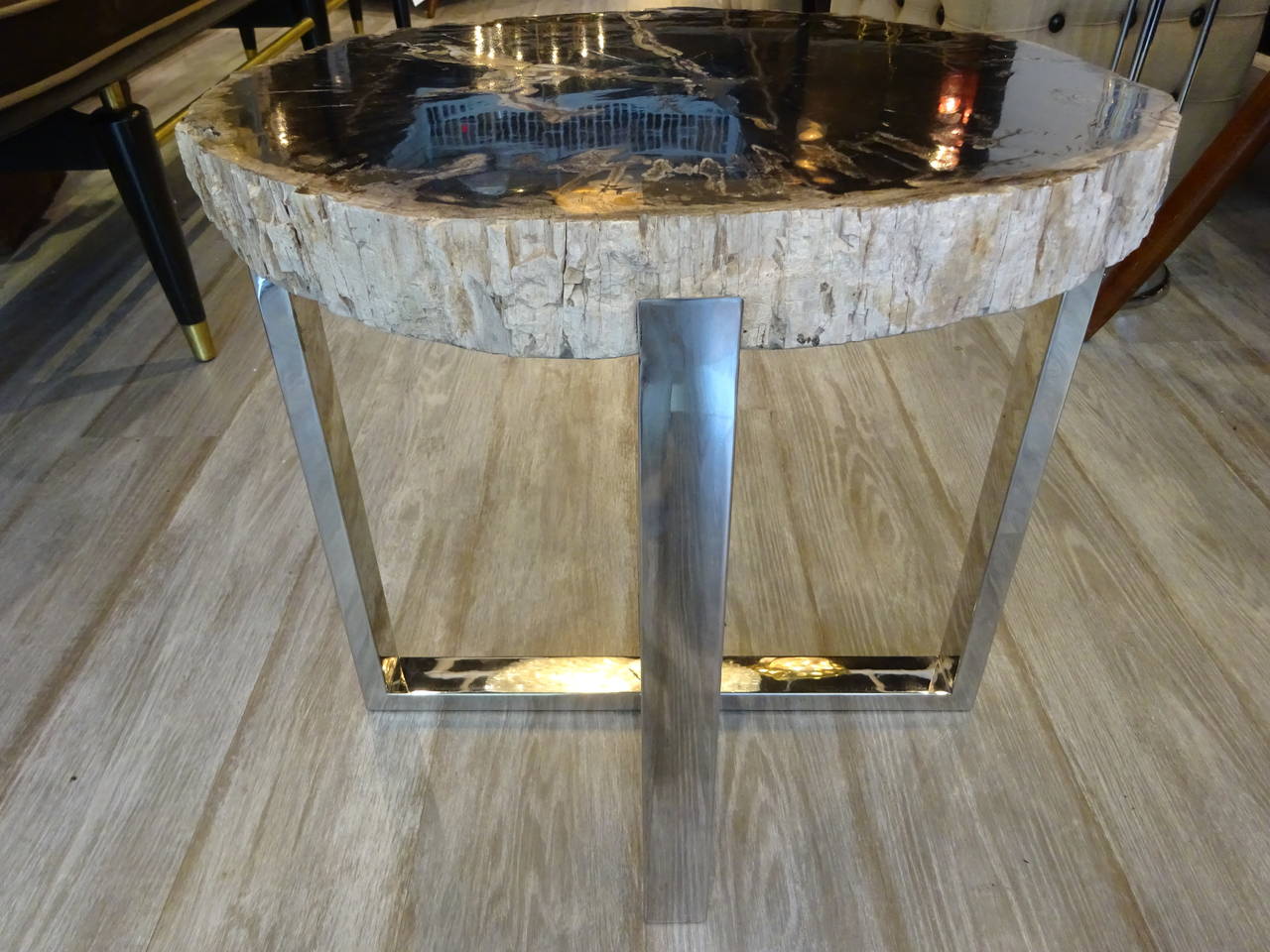 Stunning petrified wood tables with later steel 