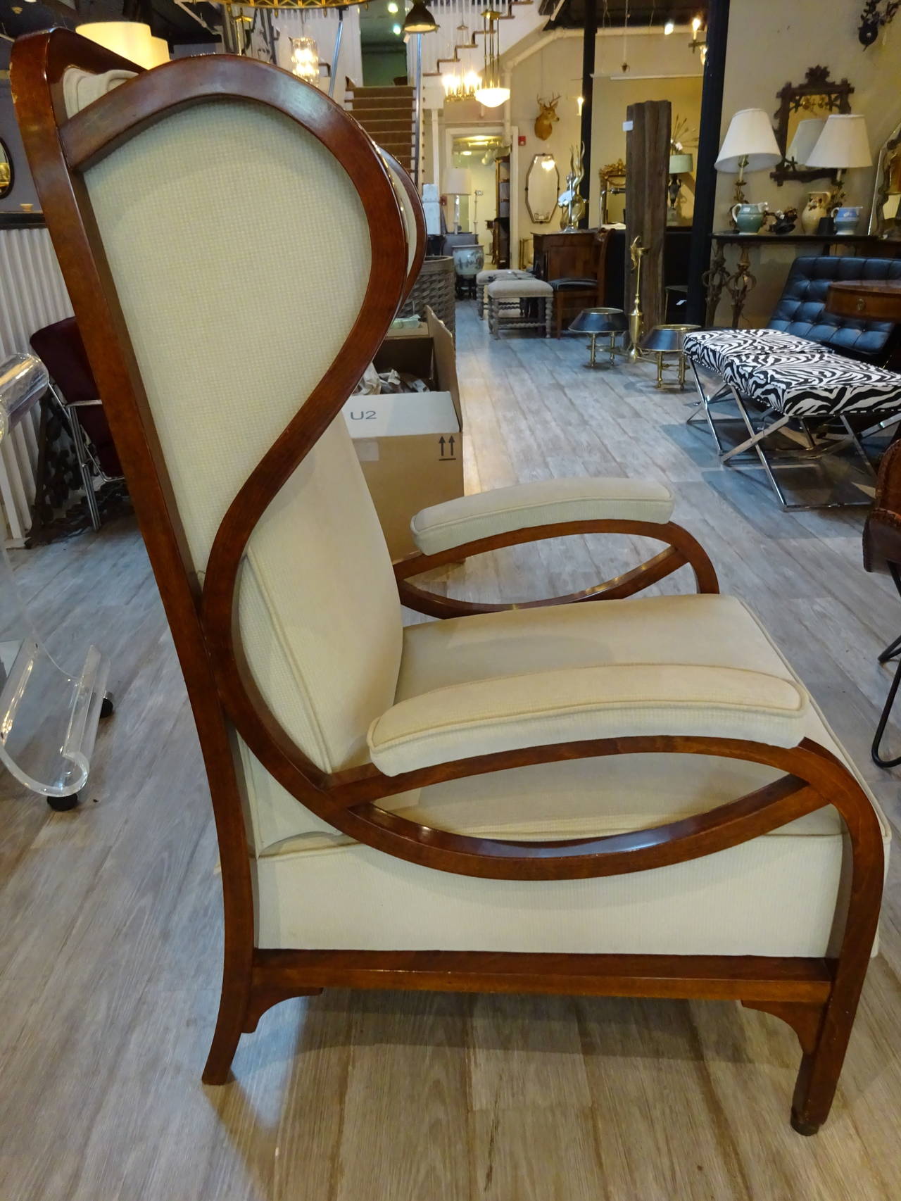 Fauteuil No. 6542, Thonet
Design by 1904, execution Fa.Thonet, Vienna, 
Viennese Wing Chair, Stained Beechwood, with recent neutral upholstery. A fine text book example of Art Nouveau furniture, beginning the transition to the Bauhaus