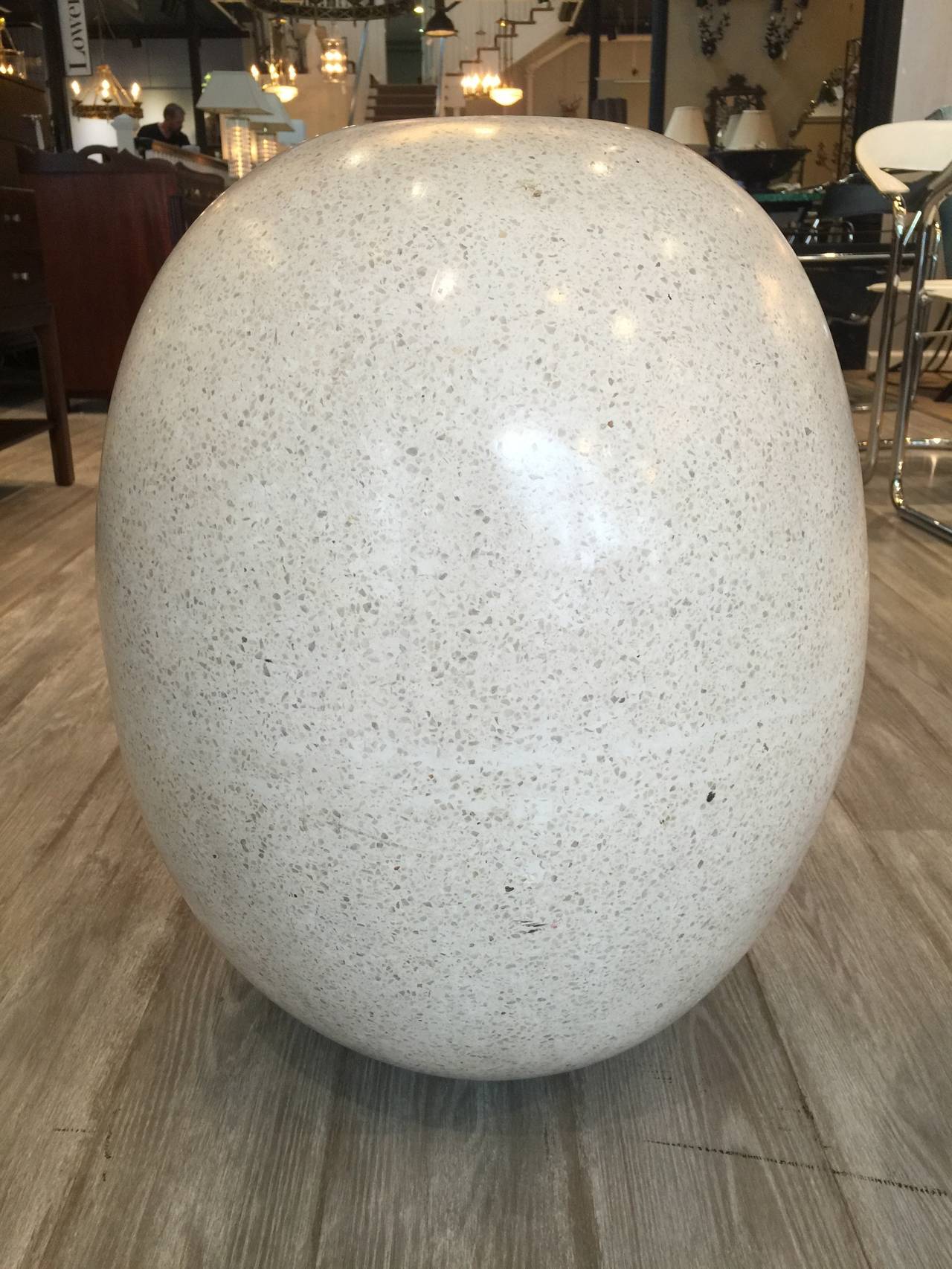 Large cast and polished stone terrazzo vase or planter, of egg shape with 7 1/2