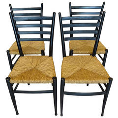 A Set of Four Ladder Back Side Chairs in the Style of Gio Ponti