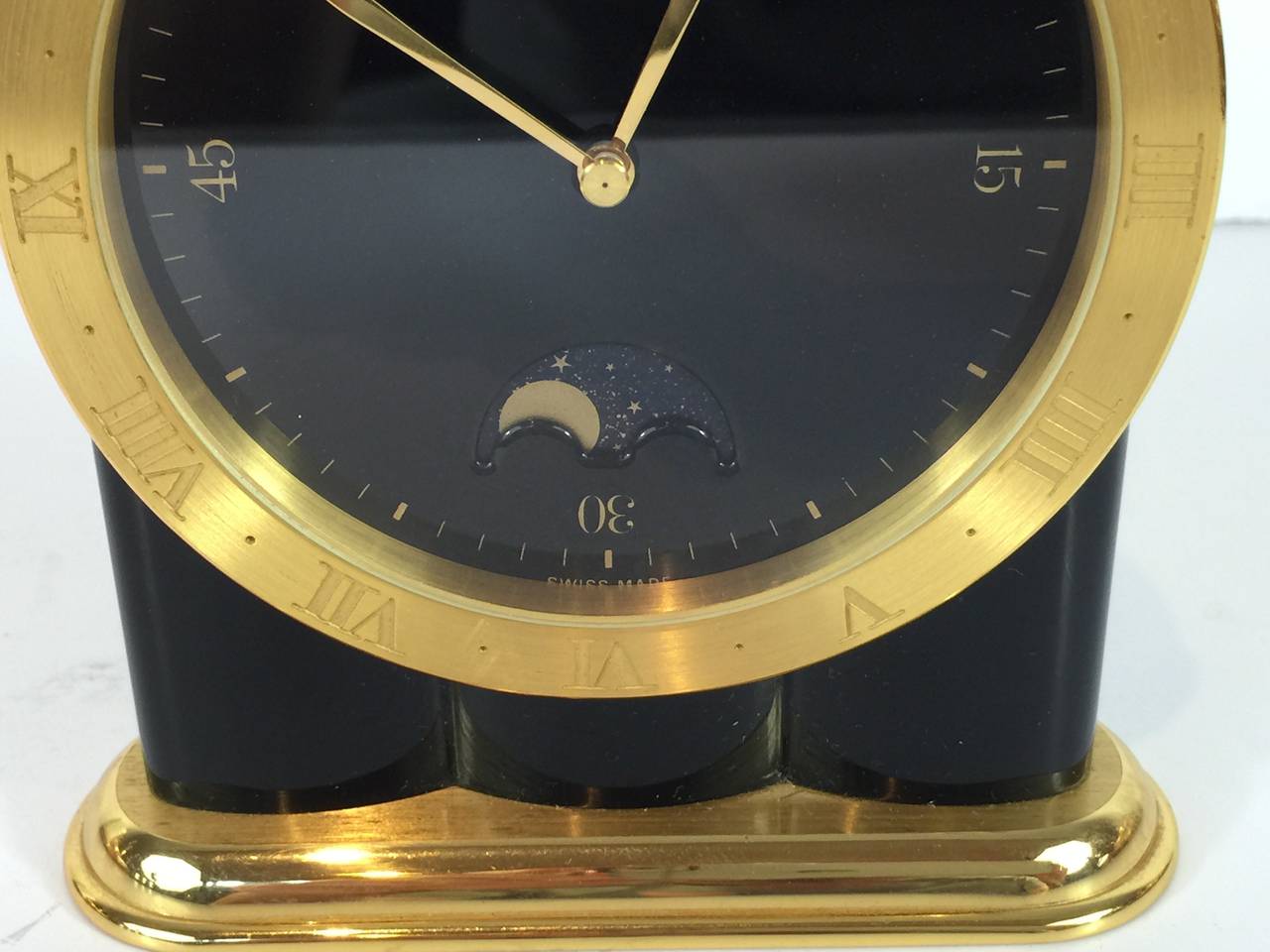 Tiffany & Co. Moon Phase Desk Clock, Swiss made battery movement, Gilt Bronze and Onyx case