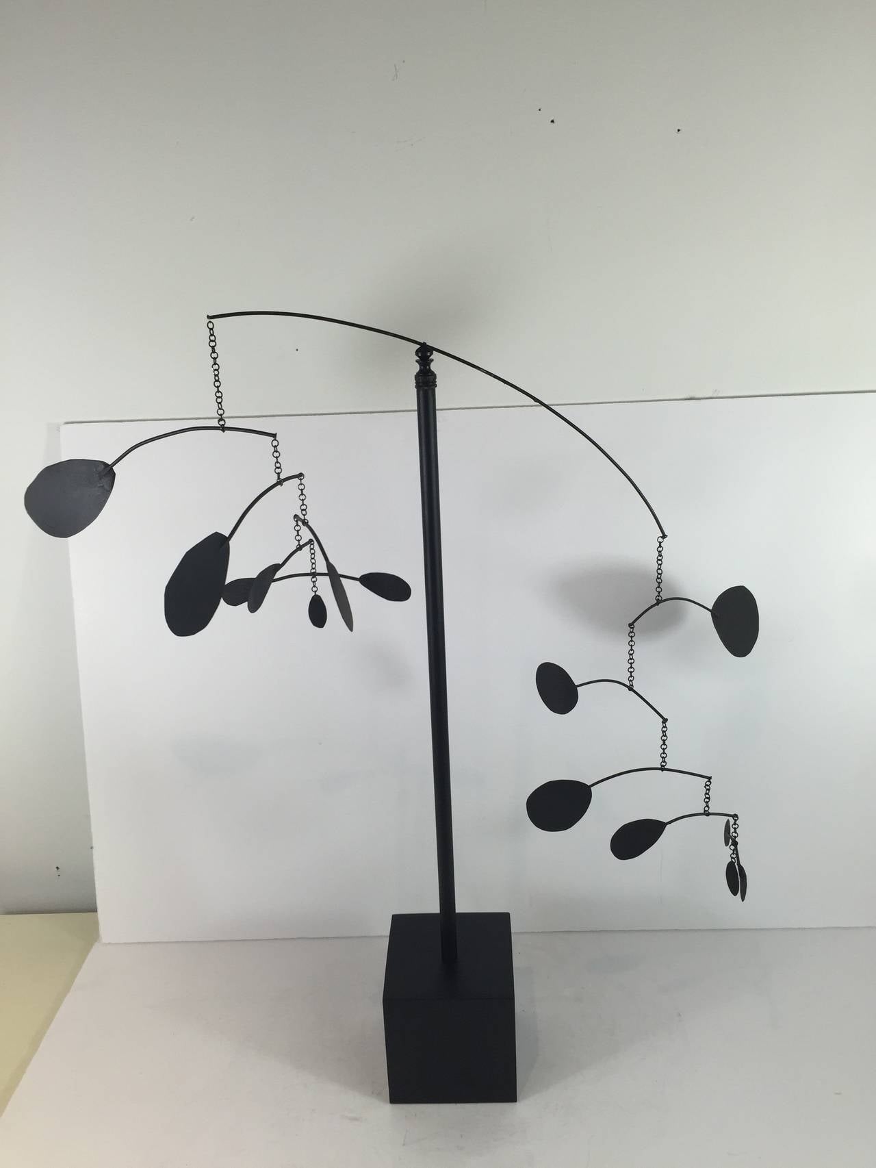Large Vintage Table-Top Mobile-In the style of Alexander Calder, the kinetic mobile can rotate, constructed of metal resting on a wood rod inset in a square 4 inch x 4 inch steel cube. Each 