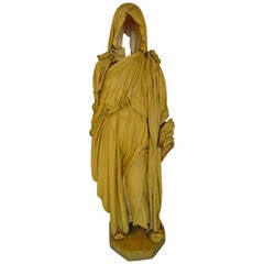 cloaked figure statue