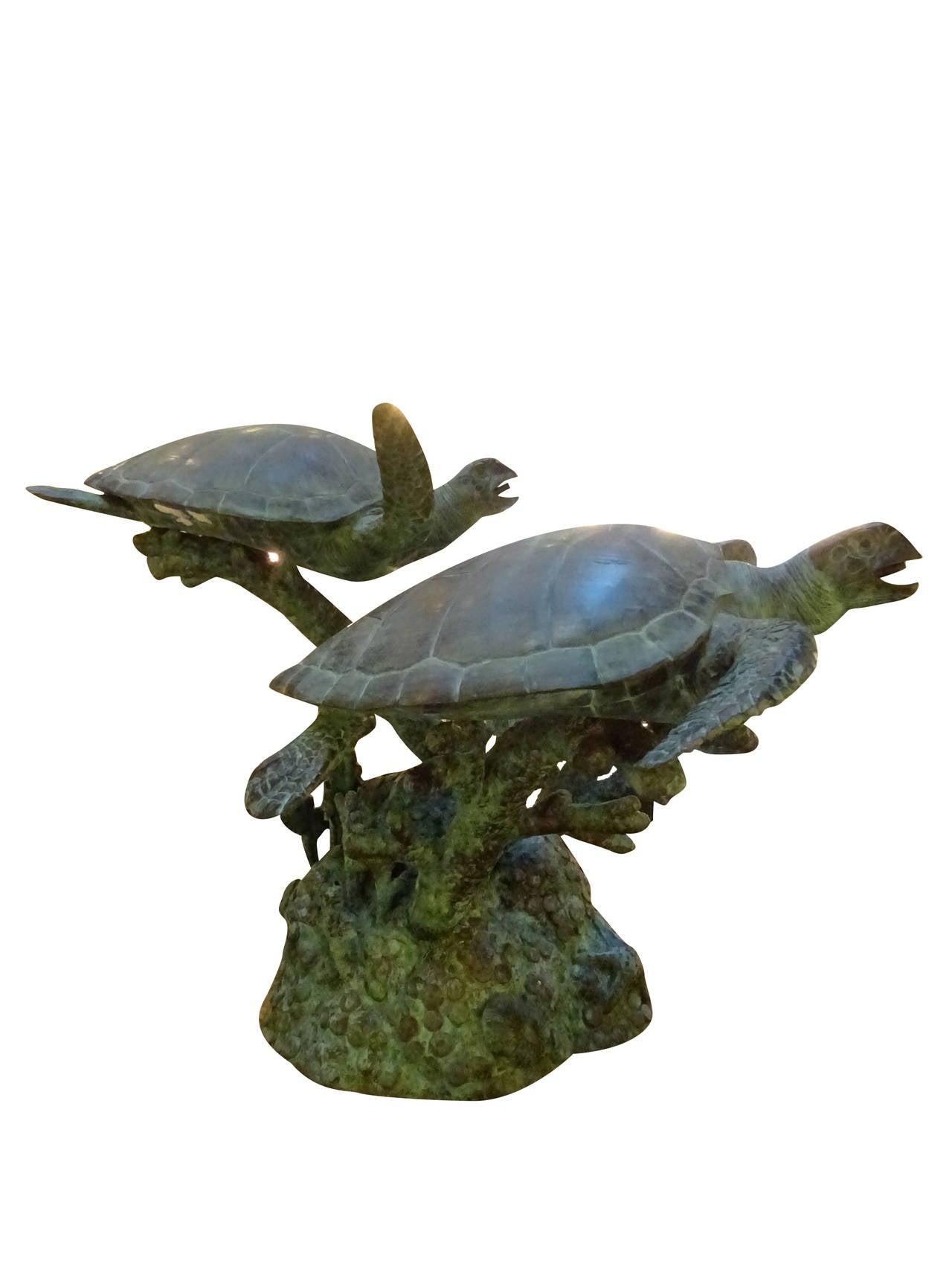 A large bronze turtle fountain with wonderful patina. Waters comes out of all three turtles mouths.