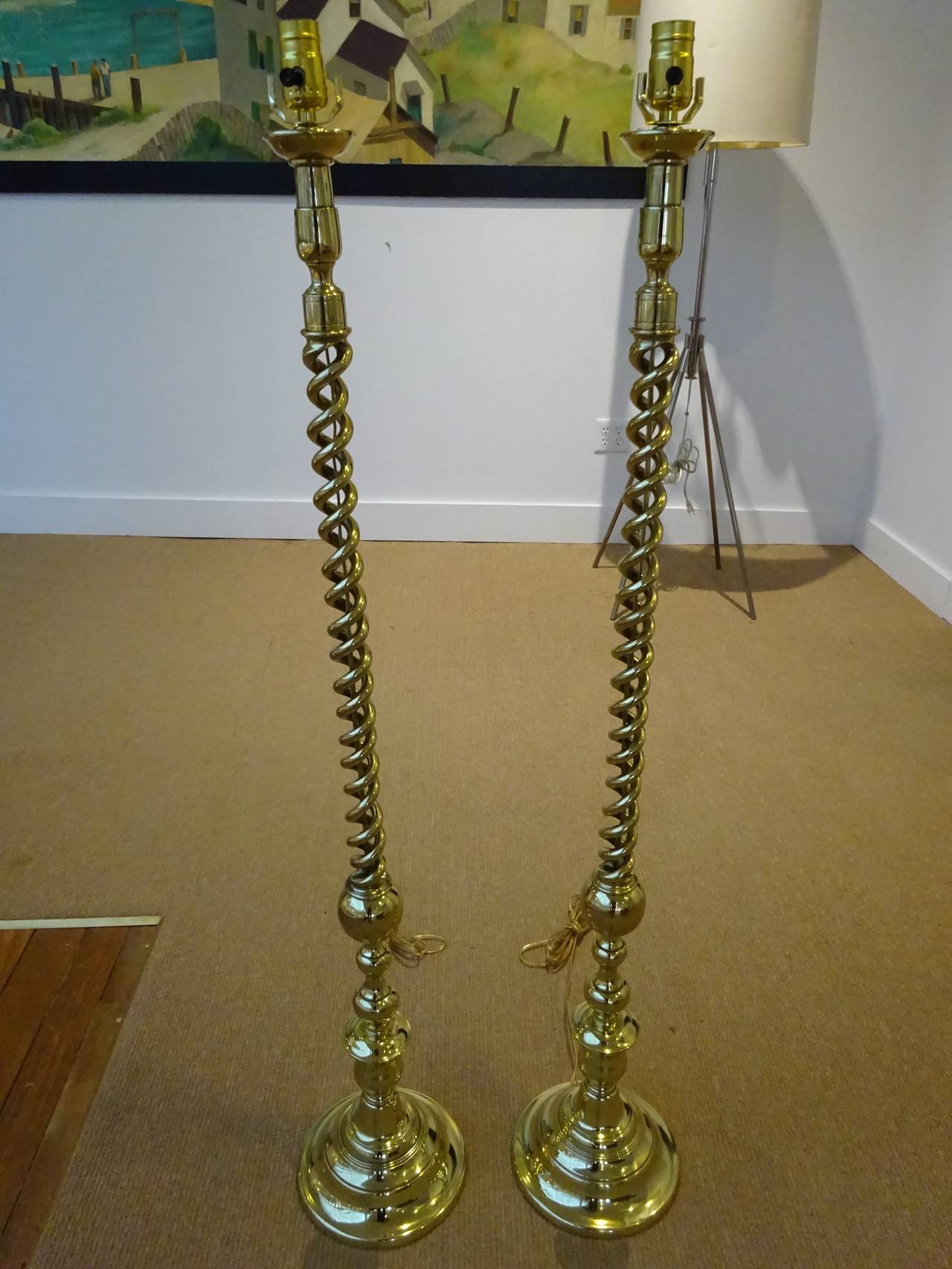 A fine pair of English brass barley twist floor lamps, each one finely cast and professionally polished and rewired.
On final sale reduced to $989!
