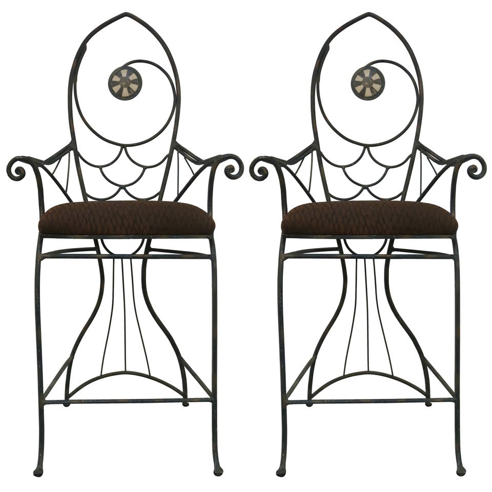 A Pair of Whimsical Wrought Iron "Fish" Bar Chairs