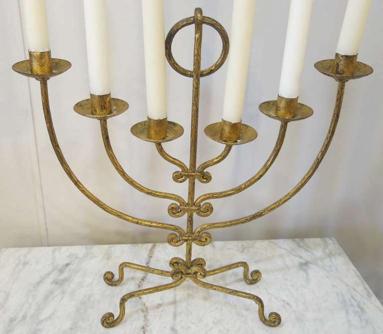 A large Italian gilt metal six light candelabra, Giacometti inspired , circa 1960.