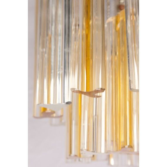 1970s Venini Trilobi small light fixture. Had made glass bars in clear or amber color hang by chain from a white enamel ceiling mount. Holds one bulb. Signed inside ceiling mount 