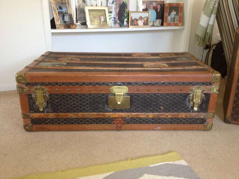 Early 20th century Goyard Monogram canvas steamer trunk with original travel stickers; Price: $6,100.

Dimensions: 
44