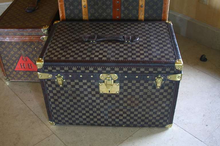 Smaller, Top-of-the-Line LOUIS VUITTON Damier Canvas Steamer Trunk in Excellent Condition; Price: $11,900.

Dimensions: 
23