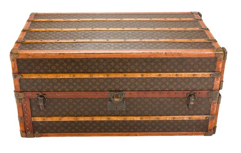 Louis Vuitton Monogram canvas top-loader wardrobe trunk, circa 1940's; Price: $22,200. Dimensions: 44" length x 22" height x 22" depth, 85 pounds.

Description: This Louis Vuitton Monogram canvas top-loader wardrobe trunk, circa