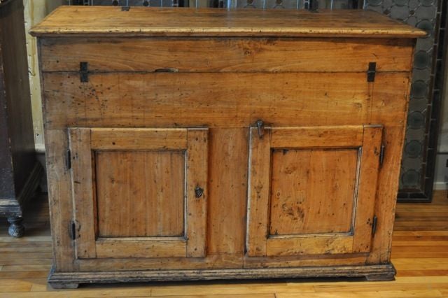 Madia is the Italian name for a chest used for the making and storage of bread. This madia is beautiful and was well used in an Italian home. The top lifts off and the front folds down at the hinges, making wonderful storage. The two doors at the