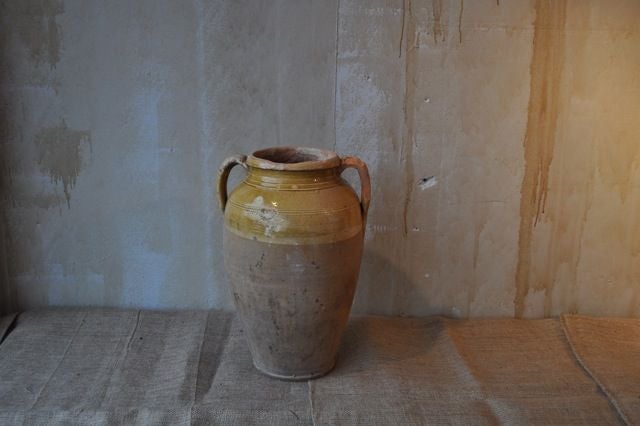 Glazed antique jar from region of Puglia in Italy. Jars like this were used for vinegar, oil or other foods.