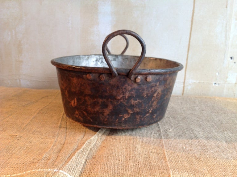 This little pot was used to cook over flames.  It dates from the 19th century and has a great look.