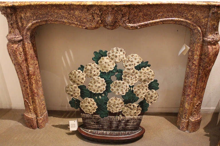 A charming 19th century French country repoussé and polychrome tin multi purpose decor/fireplace screen, in the shape of a woven basket and "blooming" with abundant white hydrangeas.