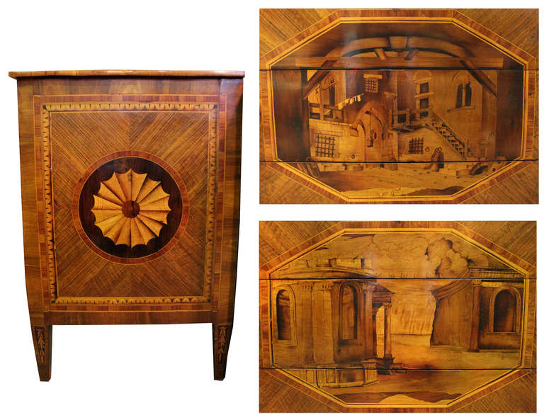 An extraordinary and rare pair of 18th century Milanese commodes, in the Maggiolini manner, in exquisite condition including the original locks and key, with marquetry scenes of an ancient villa covering the three drawers and the sides inlaid with a