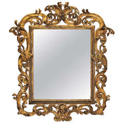 A Magnificent Mid-18th Century Italian High Rococo Giltwood Mirror