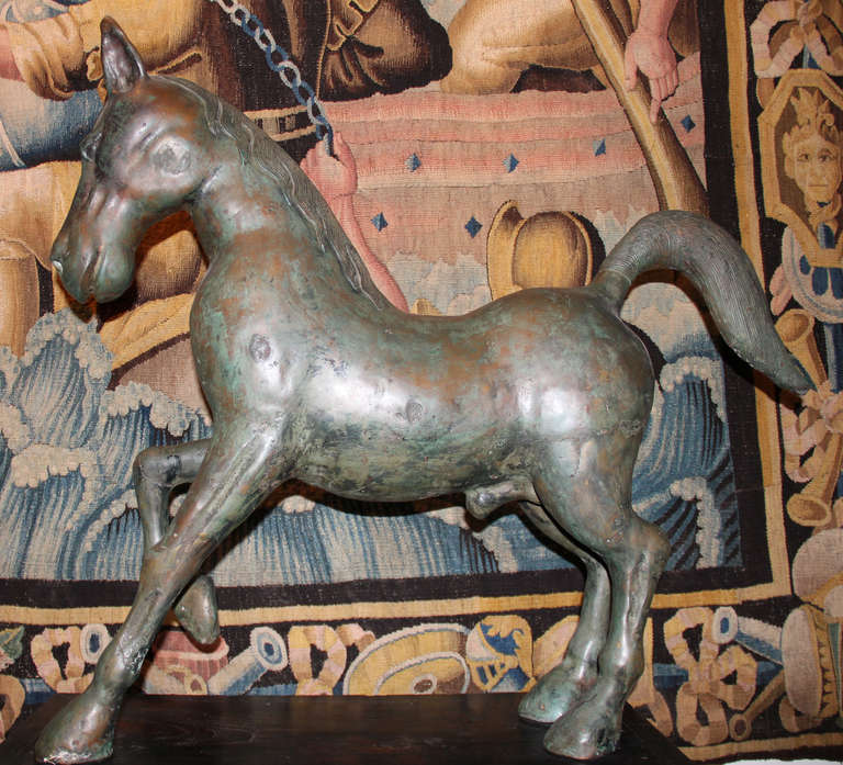 An Unusual Tribal Pair of Solid Bronze Cantering Horses In Excellent Condition In San Francisco, CA