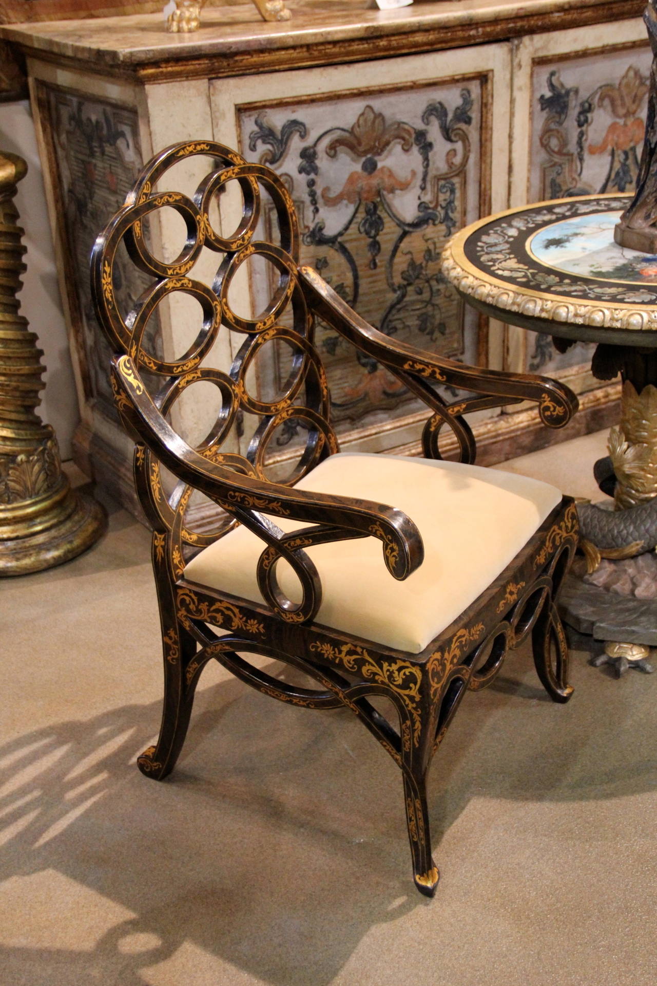 Set of Twelve George III Parcel Gilt and Black-Japanned Dining Chairs 1