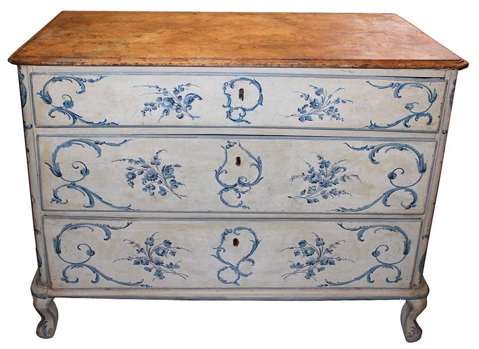 An 18th century Florentine three-drawer polychrome and faux marble commode, its original finish still intact and with two large drawers below a single smaller one with the whole raised on short cabriole legs.