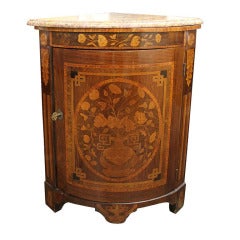 A French 18th c. Marquetry Corner Cabinet