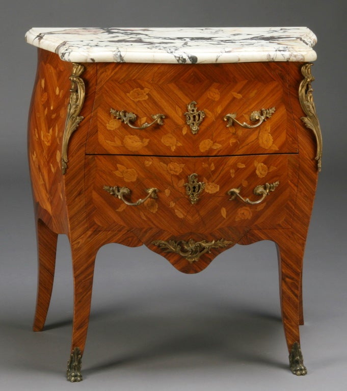19th century Louis XV-style marquetry inlaid bronze mounted marble top petite commode.