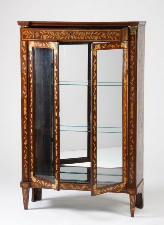 Late 19th century Dutch marquetry inlaid curio cabinet with mirrored back and glass display shelves.