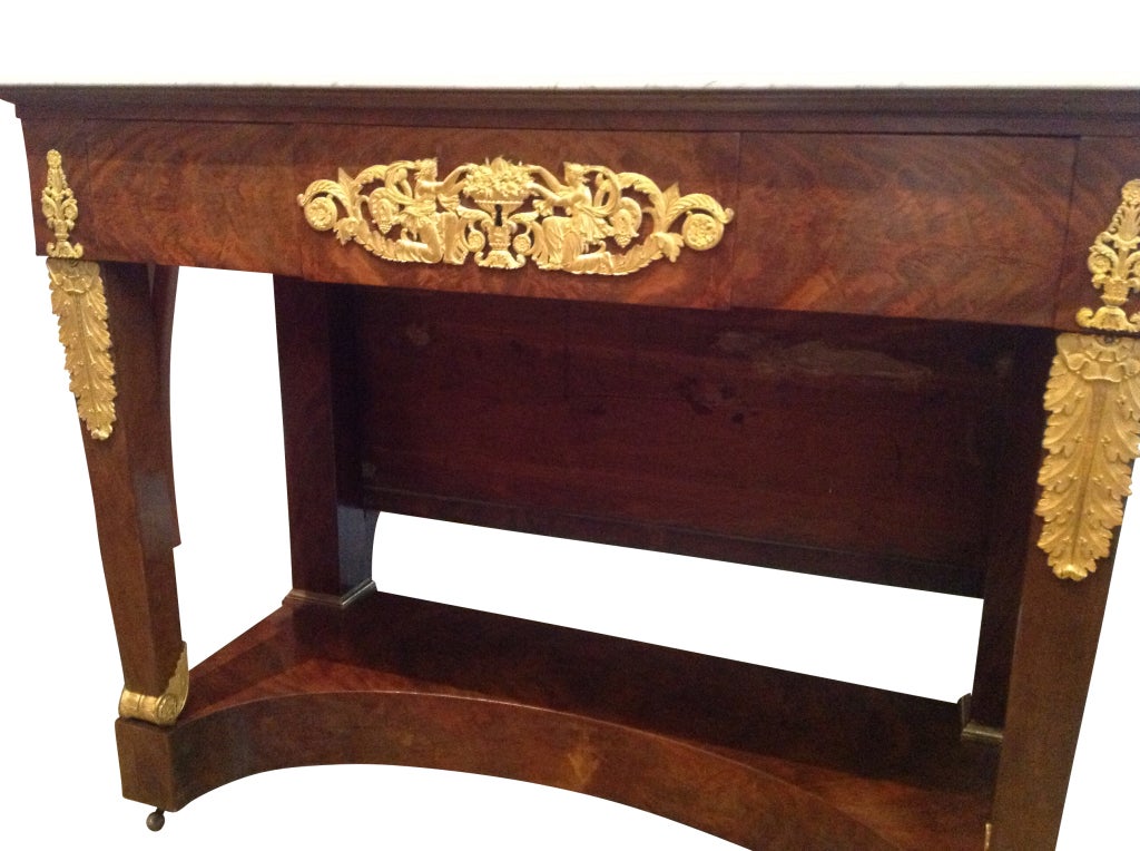 Dressing Table/Restauration/crotch mahogany with Ormolu mounts & dish marble top, side swing arm candle holders, original restored finish

Originally $ 18,500.00